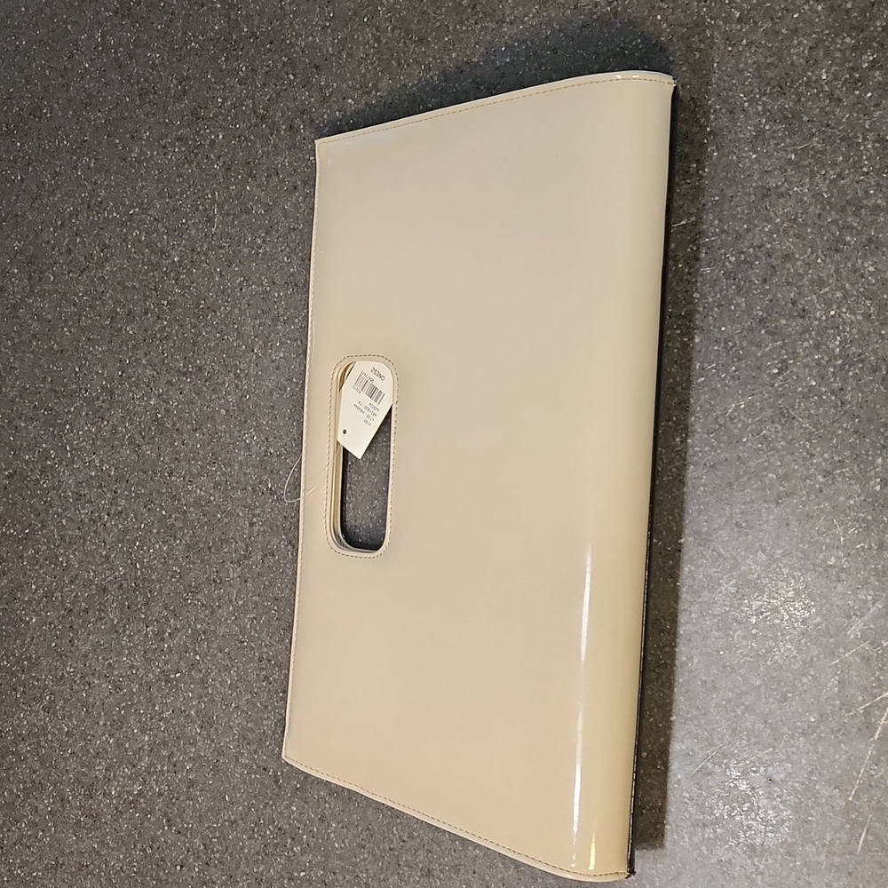 New tan and black clutch